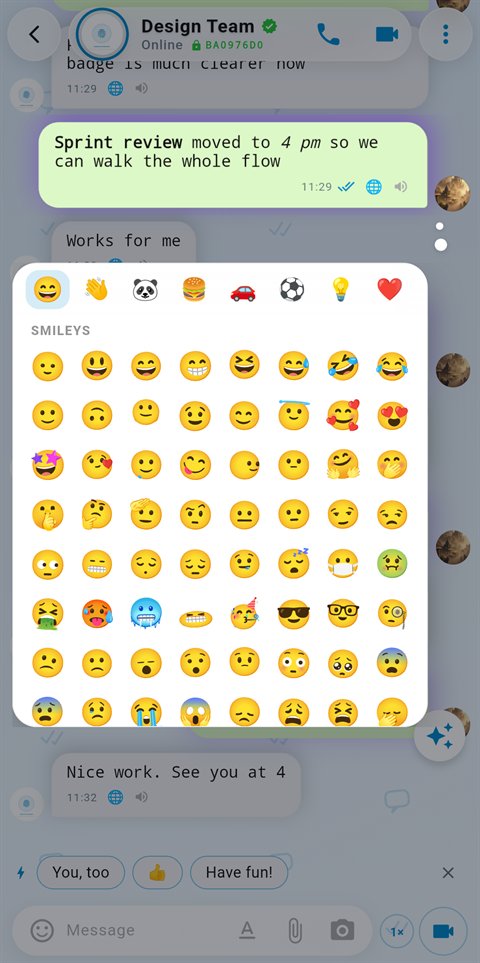 The full reaction picker open over a conversation